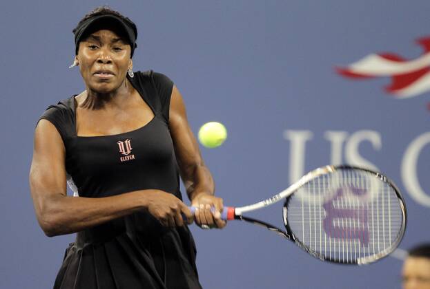 Venus Williams hits backhand in her straight sets victory on day in Arthur Ashe Stadium at the U.S. Open Tennis Championships Stadium at the Billie Jean King National Tennis Center in New York City on August 29, 2011.  NYP20110829129