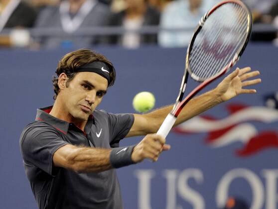 Roger Federer of Switzerland hits backhand in his match on day in Arthur Ashe Stadium at the U.S. Open Tennis Championships Stadium at the Billie Jean King National Tennis Center in New York City on August 29, 2011.  NYP20110829136