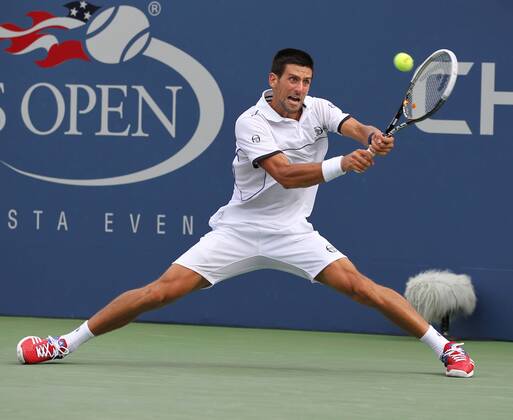 US Open 2011, USTA Billie Jean King National Tennis Center, Flushing Meadows, New York,ITF Grand Slam Tennis Tournament, Novak Djokovic (SRB),,Aktion,Einzelbild, Ganzkörper,Querformat