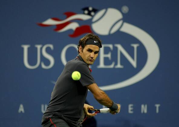 Roger Federer of Switzerland, third seed, returns the ball at the National Tennis Center on September 6, 2011 in New York.  NYP20110906336