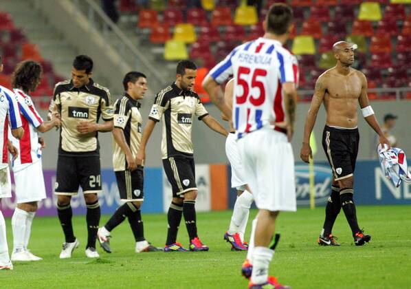 27.09.2011 Bucharest(Romania) FC Otelul Galati-SL Benfica Champions League Group C men s football Ruben Amorim(c) with Luisao(R) SL Benfica after exchanged dress with FC Otelul Galati player :