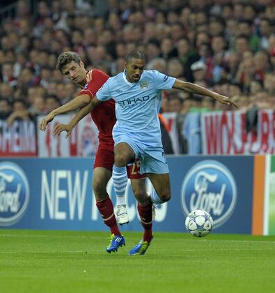 27.09.2011, Fussball UEFA-Champions-League, Vorrunde 2.Spieltag: FC Bayern München - Manchester City, in der Münchner Allianz-Arena. v.li: Thomas Müller (Bayern München) gegen Gael Clichy (Manchester City).