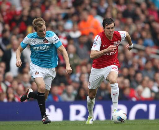 Arsenals Carl Jenkinson tussles with Sunderlands Sebastian Larsson Barclays Premier League Arsenal v Sunderland 16th October, 2011 EDITORIAL USE ONLY. No use with unauthorised audio, video, data, fixture lists, club league logos or live services. Online in-match use limited to 120 images, no video emulation. No use in betting, games or single club league player publications.