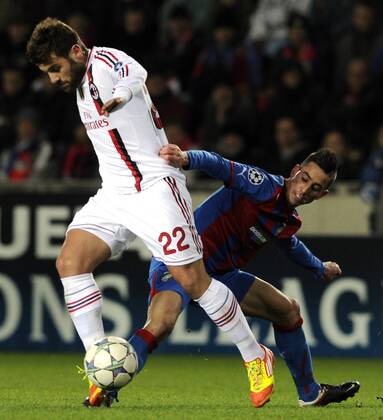 Antonio Nocerino of Milan (left) and Milan Petrzela of Viktoria during their final Champions League group H soccer match FC Viktoria Plzen vs AC Milan at Synot Tip Arena Eden stadium in Prague, Czech Republic, Tuesday, December 6, 2011. (CTKxPhoto VitxSimanek)  CTKPhoto030201112061025301