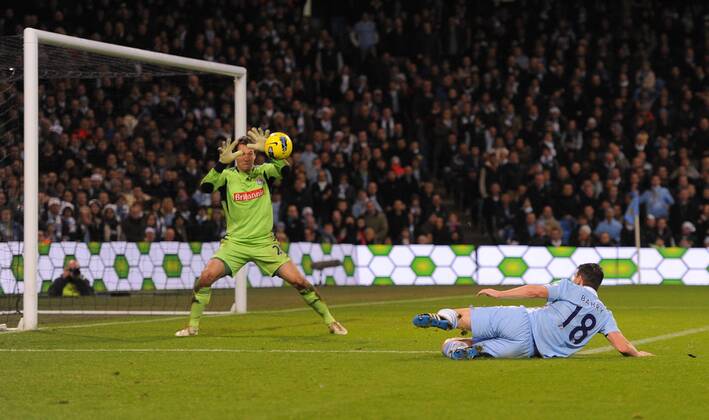 Thomas Sorensen of Stoke City saves a Gareth Barry of Manchester City volley Barclays Premier League Manchester City v Stoke City 21st December, 2011 EDITORIAL USE ONLY. No use with unauthorised audio, video, data, fixture lists, club league logos or live services. Online in-match use limited to 120 images, no video emulation. No use in betting, games or single club league player publications.