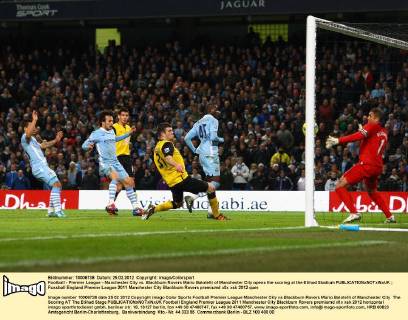 Football - Premier League - Manchester City vs. Blackburn Rovers Mario Balotelli of Manchester City opens the scoring at the Etihad Stadium 