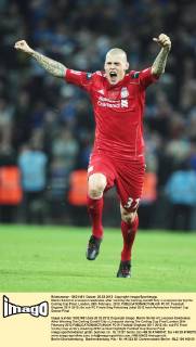 Martin Skrtel of Liverpool celebrates after winning the Carling..Cardiff City v Liverpool during the Carling Cup Final, London..26th February, 2012. EDITORIAL USE ONLY. No use with unauthorised audio, video, data, fixture lists, club league logos or live services. Online in-match use limited to 120 images, no video emulation. No use in betting, games or single club league player publications. PC 01