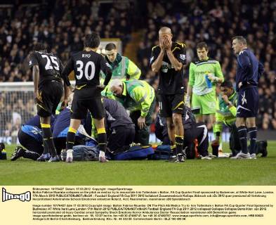Bolton Fabrice Muamba collapses on the pitch as medics try to resuscitate him Tottenham v Bolton, FA Cup Quarter Final sponsored by Budweiser, at White Hart Lane, London. 17th March 2012 EDITORIAL USE ONLY. No use with unauthorised audio, video, data, fixture lists, club league logos or live services. Online in-match use limited to 120 images, no video emulation. No use in betting, games or single club league player publications.