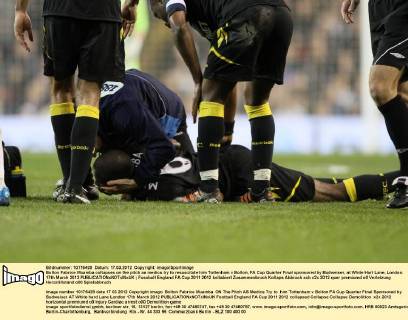 Bolton Fabrice Muamba collapses on the pitch as medics try to resuscitate him Tottenham v Bolton, FA Cup Quarter Final sponsored by Budweiser, at White Hart Lane, London. 17th March 2012 EDITORIAL USE ONLY. No use with unauthorised audio, video, data, fixture lists, club league logos or live services. Online in-match use limited to 120 images, no video emulation. No use in betting, games or single club league player publications.