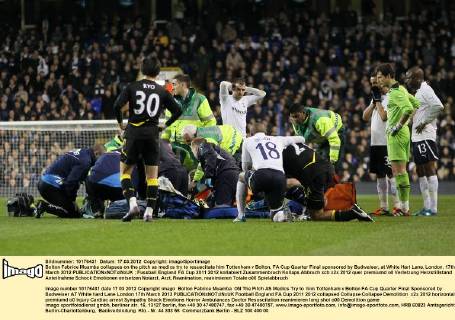 Bolton Fabrice Muamba collapses on the pitch as medics try to resuscitate him Tottenham v Bolton, FA Cup Quarter Final sponsored by Budweiser, at White Hart Lane, London. 17th March 2012 EDITORIAL USE ONLY. No use with unauthorised audio, video, data, fixture lists, club league logos or live services. Online in-match use limited to 120 images, no video emulation. No use in betting, games or single club league player publications.