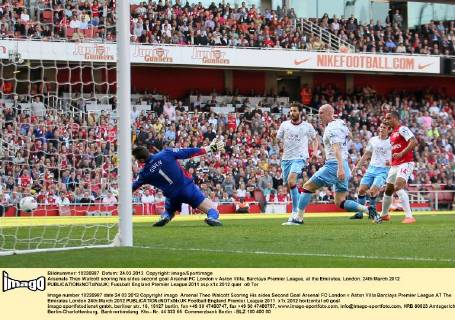 Arsenals Theo Walcott scoring his sides second goal Arsenal FC London v Aston Villa, Barclays Premier League, at the Emirates, London. 24th March 2012 EDITORIAL USE ONLY. No use with unauthorised audio, video, data, fixture lists, club league logos or live services. Online in-match use limited to 120 images, no video emulation. No use in betting, games or single club league player publications.