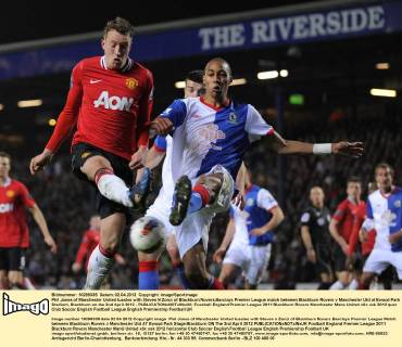 Phil Jones of Manchester United tussles with Steven N Zonzi of Blackburn Rovers.Barclays Premier League match between Blackburn Rovers v Manchester Utd at Ewood Park Stadium, Blackburn on the 2nd April 2012 - EDITORIAL USE ONLY. No use with unauthorised audio, video, data, fixture lists, club league logos or live services. Online in-match use limited to 120 images, no video emulation. No use in betting, games or single club league player publications.