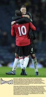 Phil Jones of Manchester United celebrates the win with Wayne Rooney of Manchester United.Barclays Premier League match between Blackburn Rovers v Manchester Utd at Ewood Park Stadium, Blackburn on the 2nd April 2012 - EDITORIAL USE ONLY. No use with unauthorised audio, video, data, fixture lists, club league logos or live services. Online in-match use limited to 120 images, no video emulation. No use in betting, games or single club league player publications.