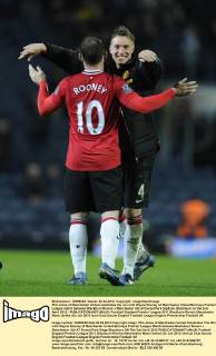Phil Jones of Manchester United celebrates the win with Wayne Rooney of Manchester United.Barclays Premier League match between Blackburn Rovers v Manchester Utd at Ewood Park Stadium, Blackburn on the 2nd April 2012 - EDITORIAL USE ONLY. No use with unauthorised audio, video, data, fixture lists, club league logos or live services. Online in-match use limited to 120 images, no video emulation. No use in betting, games or single club league player publications.