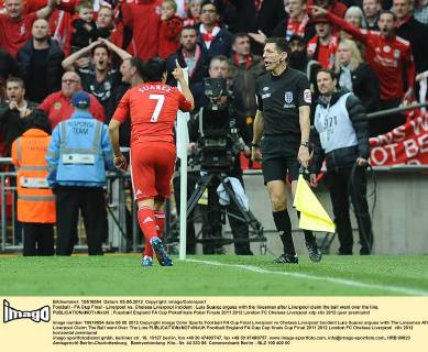 Football - FA Cup Final - Liverpool vs. Chelsea Liverpool incident : Luis Suarez argues with the linesman after Liverpool claim the ball went over the line.