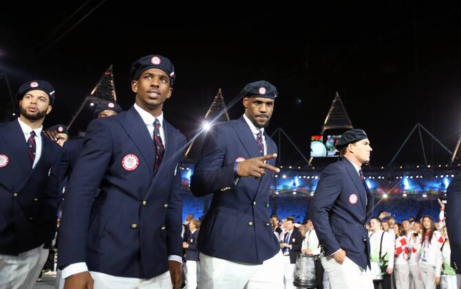 U.S. basketball player LeBron James (2nd, R) walks into the Olympic Stadium during the Opening Ceremony of the London 2012 Olympic Games at in London, Britain, July 27, 2012. (Xinhua Liao Yujie)(ly) (OLY2012)BRITAIN-LONDON-OPENING CEREMONY 