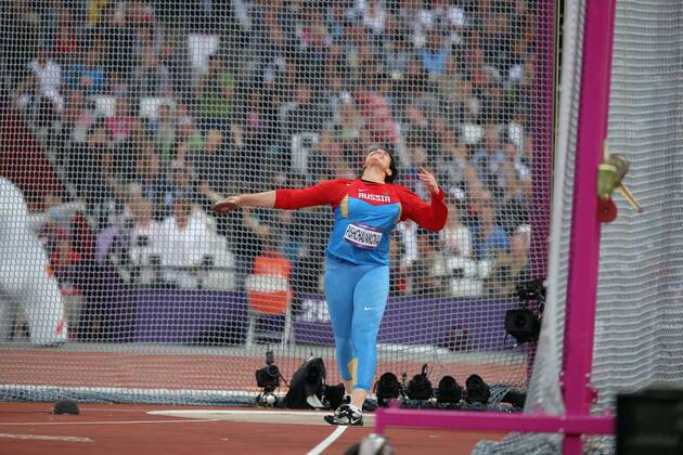 Darya Pishchalnikova of Russia competes during women s discus throw final competition, at London 2012 Olympic Games in London, Britain, on August 4, 2012. Darya Pishchalnikova of Russia won silvermedal. (Xinhua Wang Lili) (nxl) (OLY2012)BRITAIN-LONDON-ATHLETICS-WOMEN S DISCUS THROW 