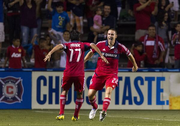 Aug. 5, 2012 - Bridgeview, Illinois, U.S - Chicago Fire defender AUSTIN BERRY (22) celebrates his second-half goal against Toronto FC with teammate PAVEL PARDO at Toyota Park. MLS Fussball Herren USA 2012: Fire Defeats Toronto FC 2-1 - ZUMAt10