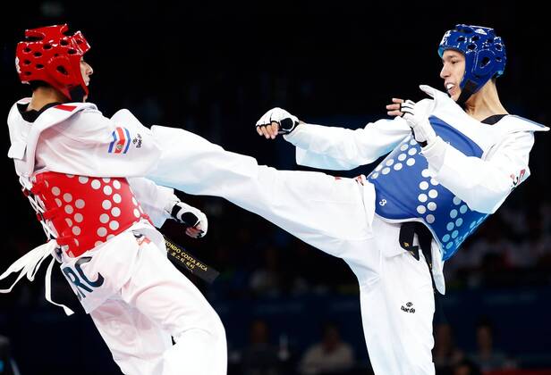 OLYMPIA - Olympische Spiele 2012 LONDON,ENGLAND,08.AUG.12 - DIVERS, OLYMPIA, KAMPFSPORT, TAEKWONDO - Olympische Sommerspiele in London 2012, bis 58kg, Herren. Bild zeigt ein Feature mit Heiner Oviedo (CRC) und Alexey Denisenko (RUS).