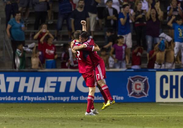 Aug. 5, 2012 - Bridgeview, Illinois, U.S - Chicago Fire defender AUSTIN BERRY (22) celebrates his second-half goal against Toronto FC with teammate PAVEL PARDO at Toyota Park. MLS Fussball Herren USA 2012: Fire Defeats Toronto FC 2-1 - ZUMAt10