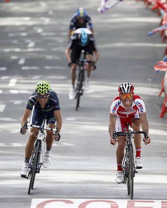 Alejandro Valverde (1st) (L), Joaquin Purito Rodriguez (2nd) at the finish line of the stage of La Vuelta 2012 between Faustino V and Eibar (Arrate).August 20,2012.  (201208203025)