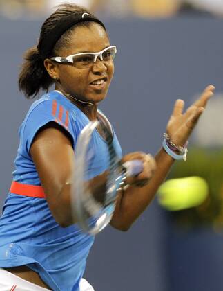 Victoria Duval hits a forehand in first round match at the 2012 U.S. Open Tennis Championships in Arthur Ashe Stadium at the Billie Jean King National Tennis Center in New York City on August 27, 2012.  NYP20120827120