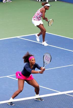 Serena Williams (L) and her sister Venus, USA during the first-round women s double match at the 2012 U.S. Open held at the National Tennis Center on August 29, 2012 in New York. UPI Photo Monika Graff  NYP20120829340