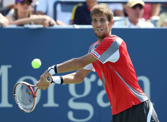 US Open 2012, USTA Billie Jean King National Tennis Center, Flushing Meadows, New York, ITF Grand Slam Tennis Tournament . Martin Klizan (SVK) Aktion, Einzelbild, , Querformat,