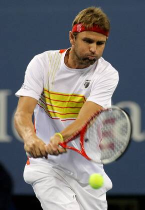 Mardy Fish, USA, returns in the first set of third-round action at the 2012 U.S. Open held at the National Tennis Center on September 1, 2012.  NYP20120901333