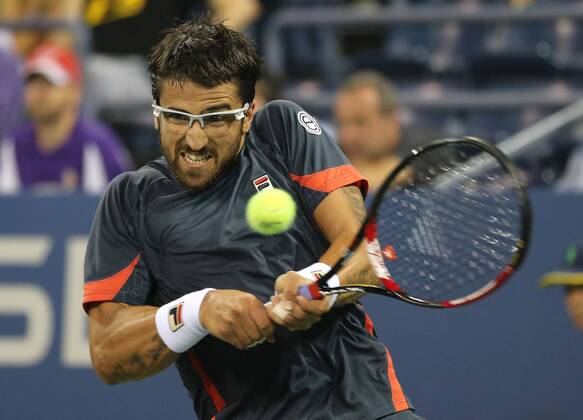 US Open 2012, USTA Billie Jean King National Tennis Center, Flushing Meadows, New York, ITF Grand Slam Tennis Tournament , Janko Tipsarevic (SRB), Aktion, Einzelbild, Halbkörper,Querformat,