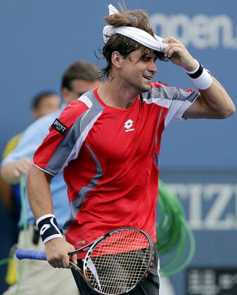 David Ferrer of Spain reacts after match point on day 11 in Arthur Ashe Stadium at the BillieJeanKing National Tennis Center in New York City on September 6, 2012.  NYP20120906121