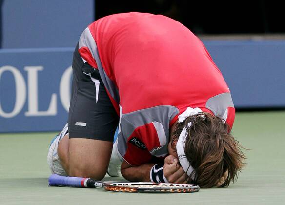David Ferrer of Spain reacts after match point on day 11 in Arthur Ashe Stadium at the BillieJeanKing National Tennis Center in New York City on September 6, 2012.  NYP20120906122
