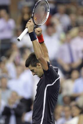 Novak Djokovic of Serbia reacts after winning a point in the second set in his quarterfinal match on day 11 in Arthur Ashe Stadium at the BillieJeanKing National Tennis Center in New York City on September 6, 2012.  NYP20120906150