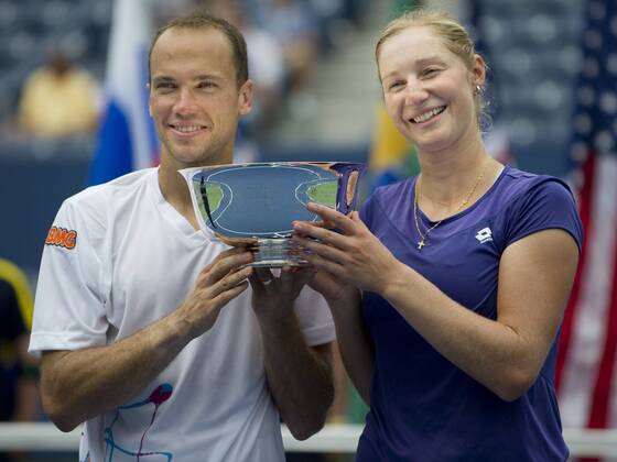 September 06, 2012: Ekaterina Makarova of Russia, and Bruno Soares of Brazil celebrate to become the 2012 US Open Mixed Doubles Champions. during the US Open tennis tournament at the BillieJeanKing National Tennis Center in Flushing, NY. TENNIS: SEP 06 US Open Icon20143368 EDITORIAL USE ONLY