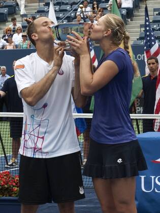 September 06, 2012: Ekaterina Makarova of Russia, and Bruno Soares of Brazil celebrate to become the 2012 US Open Mixed Doubles Champions. during the US Open tennis tournament at the BillieJeanKing National Tennis Center in Flushing, NY. TENNIS: SEP 06 US Open Icon20143369 EDITORIAL USE ONLY