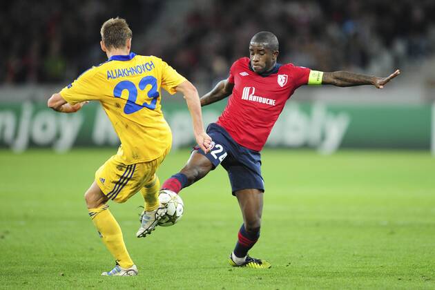 Rio Mavuba (Losc) vs Edgar Olekhnovic (Borisov) FOOTBALL : Losc Lille vs Fc Bate Borisov - champions League - 19 09 2012 JBAutissier Panoramic 