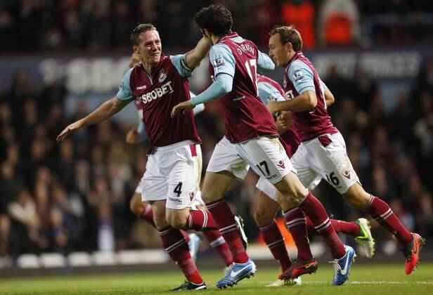 West Ham s Kevin Nolan celebrates with goalscorer Joey O Brien.. West Ham United - Stoke City. Premier League- Upton Park, London- 19 11 12 - xDavidxKleinxSportimagex EDITORIAL USE ONLY. No use with unauthorised audio, video, data, fixture lists, club league logos or live services. Online in-match use limited to 120 images, no video emulation. No use in betting, games or single club league player publications.
