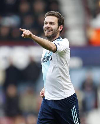 Chelsea s Juan Mata celebrates scoring his sides opening goal..West Ham v Chelsea -Premier League- Upton Park, London- 1 12 12 - EDITORIAL USE ONLY. No use with unauthorised audio, video, data, fixture lists, club league logos or live services. Online in-match use limited to 120 images, no video emulation. No use in betting, games or single club league player publications.