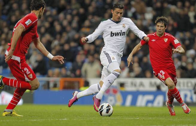 Madrid 09 02 2013. Football match between Real Madrid FC and FC Sevilla corresponding to the 23th day of the Spanish League, held at the Santiago Bernabeu stadium, in Madrid 02 09 2013. Cristiano Ronaldo score vs Coke