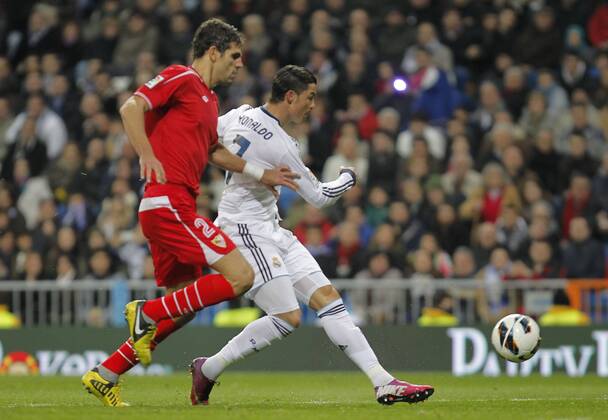 Madrid 09 02 2013. Football match between Real Madrid FC and FC Sevilla corresponding to the 23th day of the Spanish League, held at the Santiago Bernabeu stadium, in Madrid 02 09 2013. Cristiano Ronaldo score vs Federico Fazio