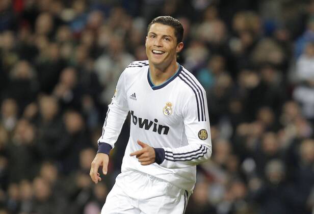 Madrid 09 02 2013. Football match between Real Madrid FC and FC Sevilla corresponding to the 23th day of the Spanish League, held at the Santiago Bernabeu stadium, in Madrid 02 09 2013. Cristiano Ronaldo celebrate his third goal after scoring