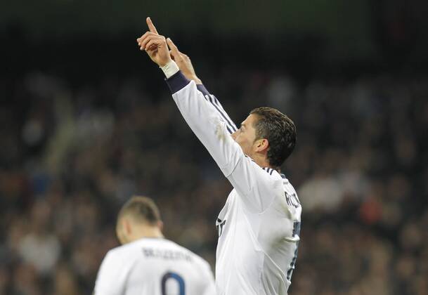 Madrid 09 02 2013. Football match between Real Madrid FC and FC Sevilla corresponding to the 23th day of the Spanish League, held at the Santiago Bernabeu stadium, in Madrid 02 09 2013. Cristiano Ronaldo celebrate his third goal after scoring