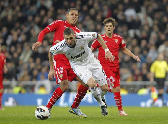 Madrid 09 02 2013. Football match between Real Madrid FC and FC Sevilla corresponding to the 23th day of the Spanish League, held at the Santiago Bernabeu stadium, in Madrid 02 09 2013. Karim Benzema vs Hedwiges Maduro