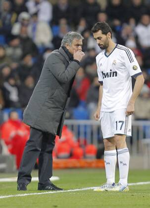 Madrid 09 02 2013. Football match between Real Madrid FC and FC Sevilla corresponding to the 23th day of the Spanish League, held at the Santiago Bernabeu stadium, in Madrid 02 09 2013. Jose Mourinho y Alvaro Arbeloa