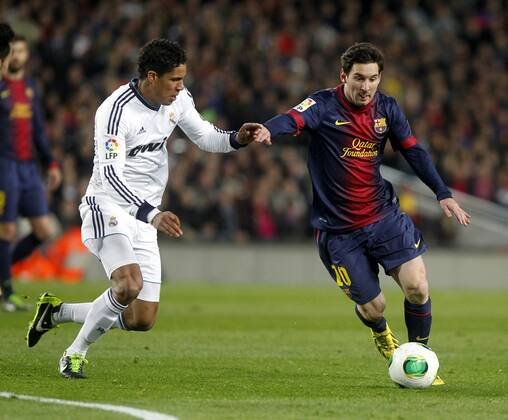 Copa del Rey. FC Barcelona vs Real Madrid. Lionel Messi and Raphael Varane.
