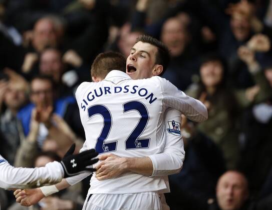 Tottenham s Gareth Bale celebrates scoring his sides opening goal..Tottenham Hotspur v Arsenal- Barclays Premier League - White Hart Lane, London- 3 03 13 - Picture David Klein Sportimage EDITORIAL USE ONLY. No use with unauthorised audio, video, data, fixture lists, club league logos or live services. Online in-match use limited to 120 images, no video emulation. No use in betting, games or single club league player publications.