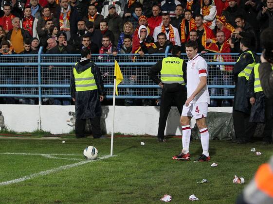 England s Steven Gerrard gets pelted by missiles..Montenegro v England- World Cup Qualifier - Podgorica City Stadium, Podgorica- 26 03 13 - Picture David Klein Sportimage EDITORIAL USE ONLY. No use with unauthorised audio, video, data, fixture lists, club league logos or live services. Online in-match use limited to 120 images, no video emulation. No use in betting, games or single club league player publications.