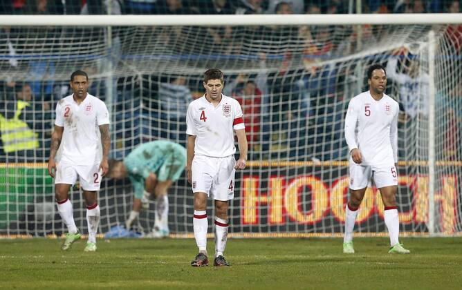 England s Steven Gerrard looks on dejected after going 1-1..Montenegro v England- World Cup Qualifier - Podgorica City Stadium, Podgorica- 26 03 13 - Picture David Klein Sportimage EDITORIAL USE ONLY. No use with unauthorised audio, video, data, fixture lists, club league logos or live services. Online in-match use limited to 120 images, no video emulation. No use in betting, games or single club league player publications.