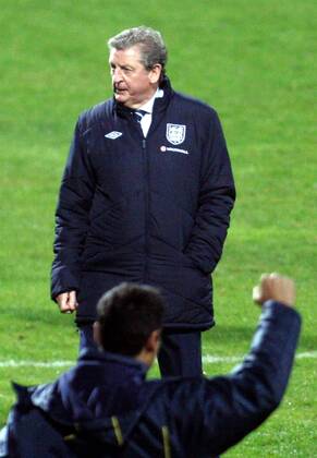 26.03.2013 Podgorica(Montenegro) Montenegro-England FIFA world cup Brazil qualifiers men football Roy Hodgson England head coach after match and member of Montenegro coaching staff( in front) who celebrate :