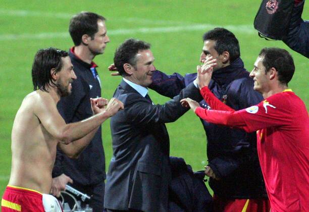 26.03.2013 Podgorica(Montenegro) Montenegro-England FIFA world cup Brazil qualifiers men football Branko Brnovic(3L) Montenegro head coach celebrate good result after match with Dejan Damjanovic(L),Mitar Novakovic(2nd from right) and Andrija Delibasic(r) :